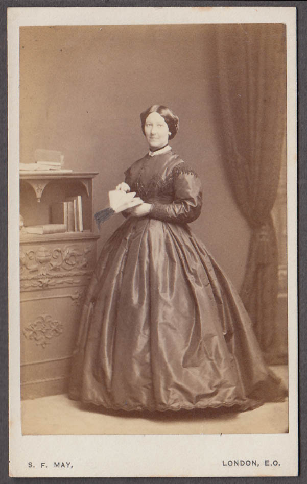 Image for Woman standing with book & bookcase CDV by S F May London 1860s