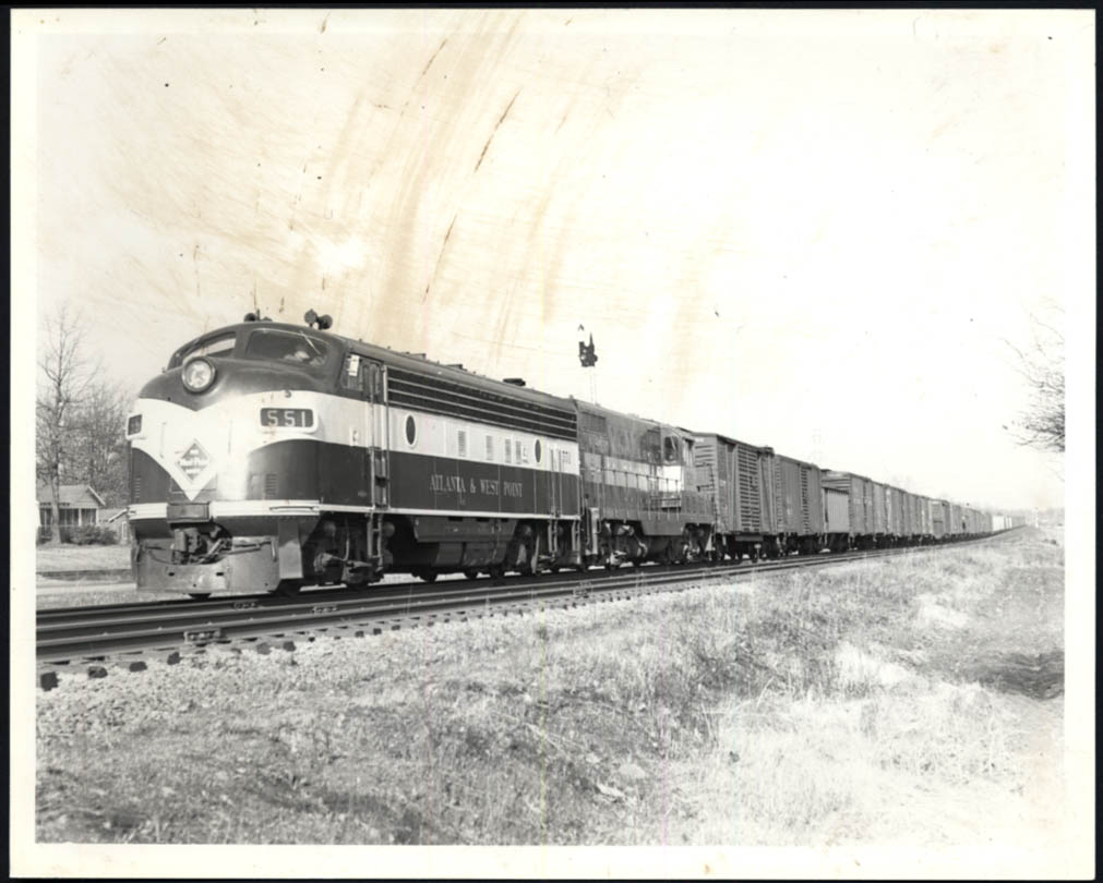 Image for Atlanta & West Point Railroad GM #551 heading a freight Red Oak GA photo 1952