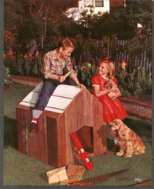 Image for Boy builds doghouse for girl with cocker spaniels calendar sample insert 1950s