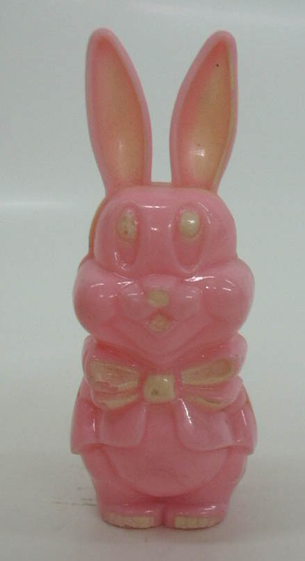 Image for Pink bunny with white bow tie plastic Easter rattle figure 3 3/4" tall